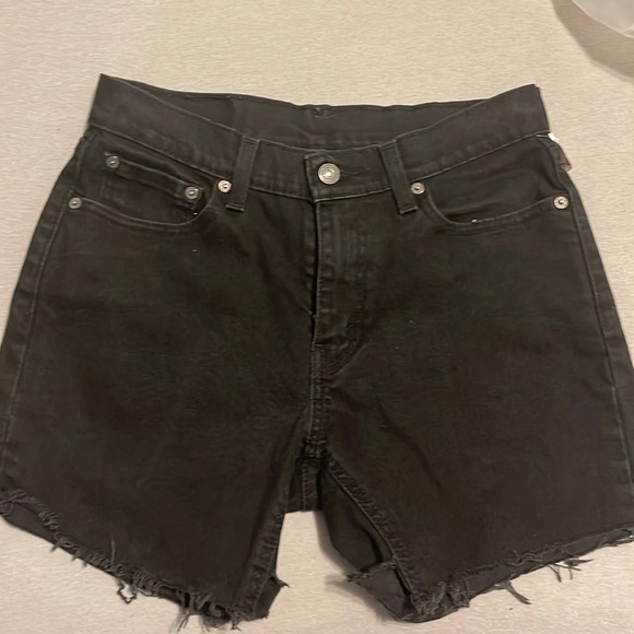 Cute black Levi’s 501 shorts, I would say it’s pretty high rise - Picture 1 of 7